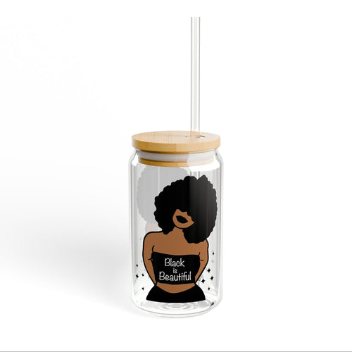 Tumbler with a design of a woman's silhouette and 'Black is Beautiful' text, on a white background.