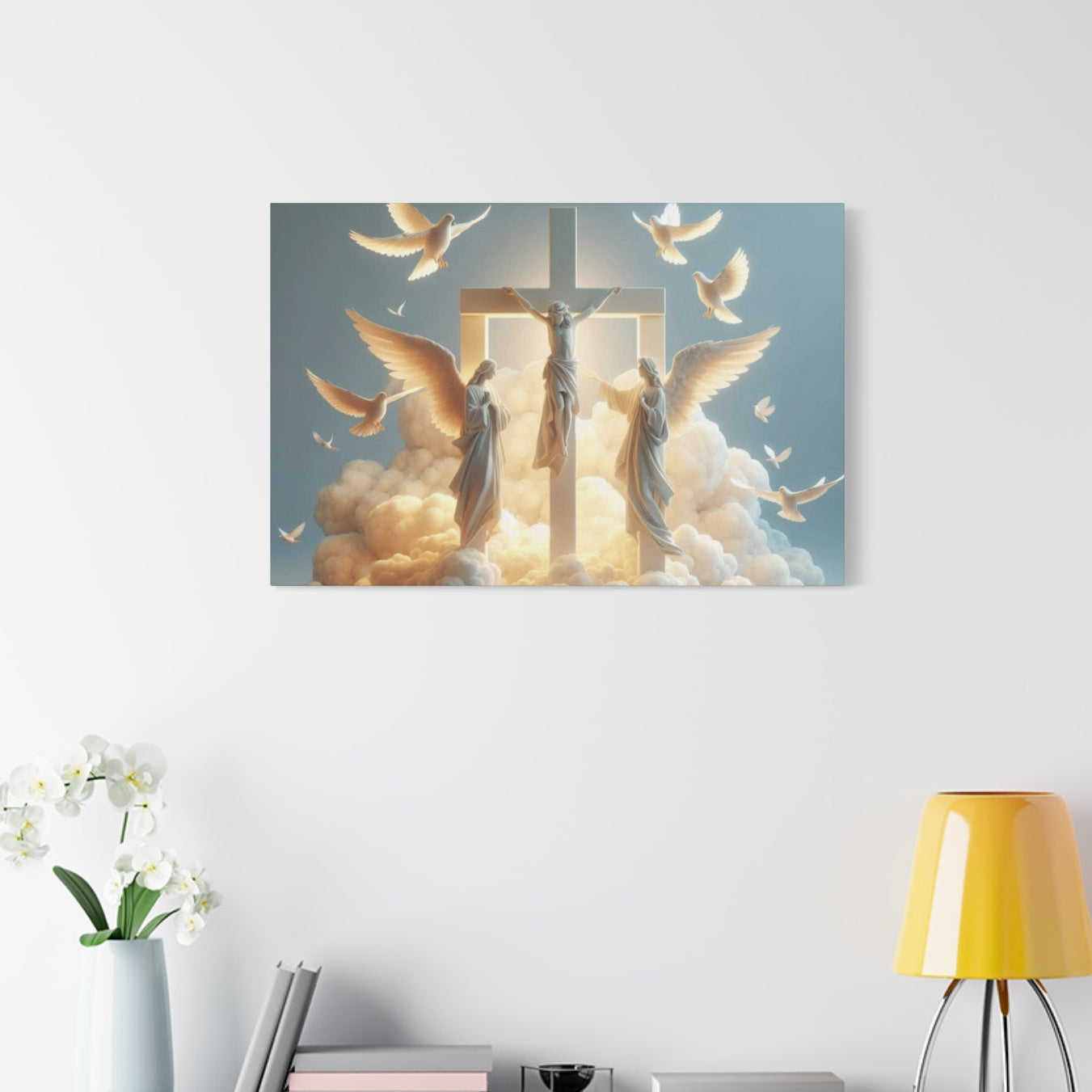 Decorative wall art with angelic design on a light blue background, placed above a desk with a lamp and flowers.