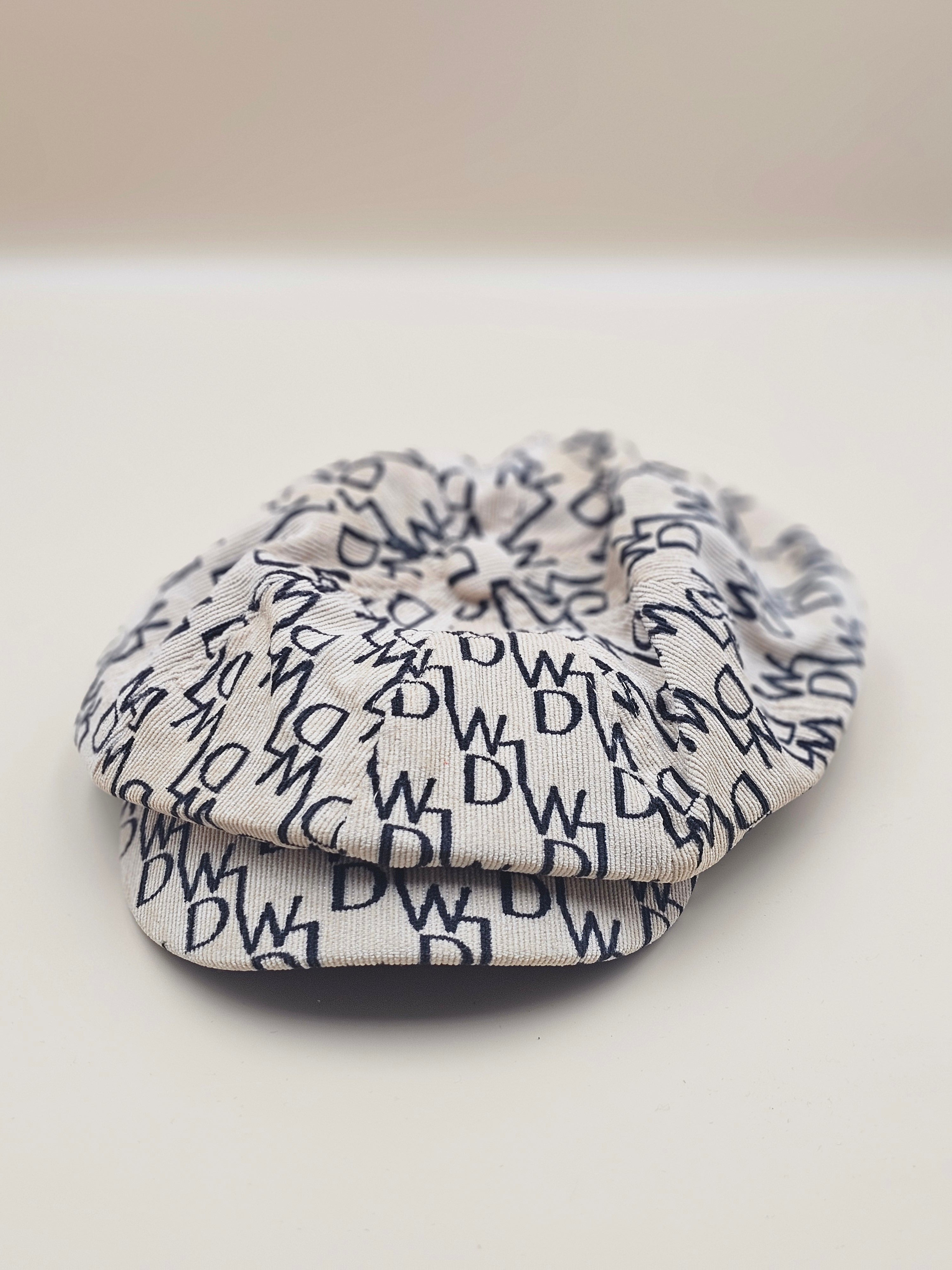 The "Mini Fashionista" Newsboy Cap – Monogram Print Hat